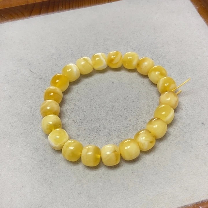 月***推未镶嵌蜜蜡裸石手串