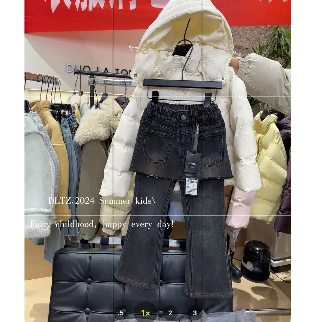 D25062「奔跑的蜗牛」简约款假两件屁帘款微喇牛仔裤