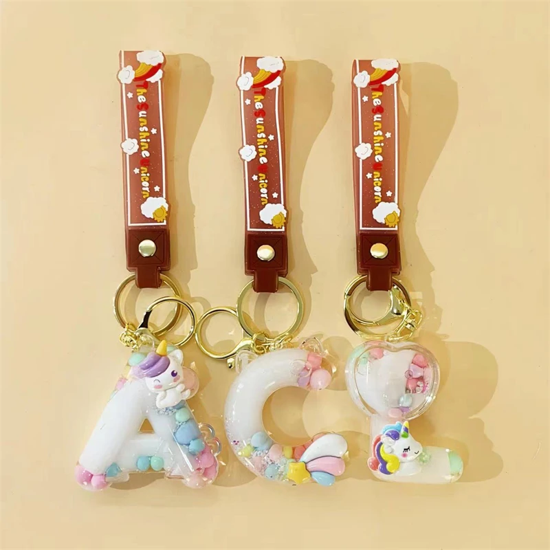 新款可爱字母挂件液体精致流沙书包卡通汽车钥匙链钥匙扣情侣挂饰