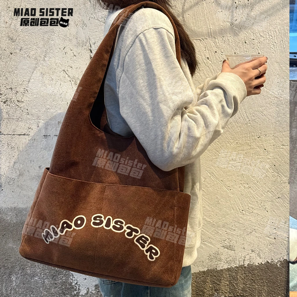 MIAO美拉德纹理感三角托特布包单肩包大容量中性百搭复古大包