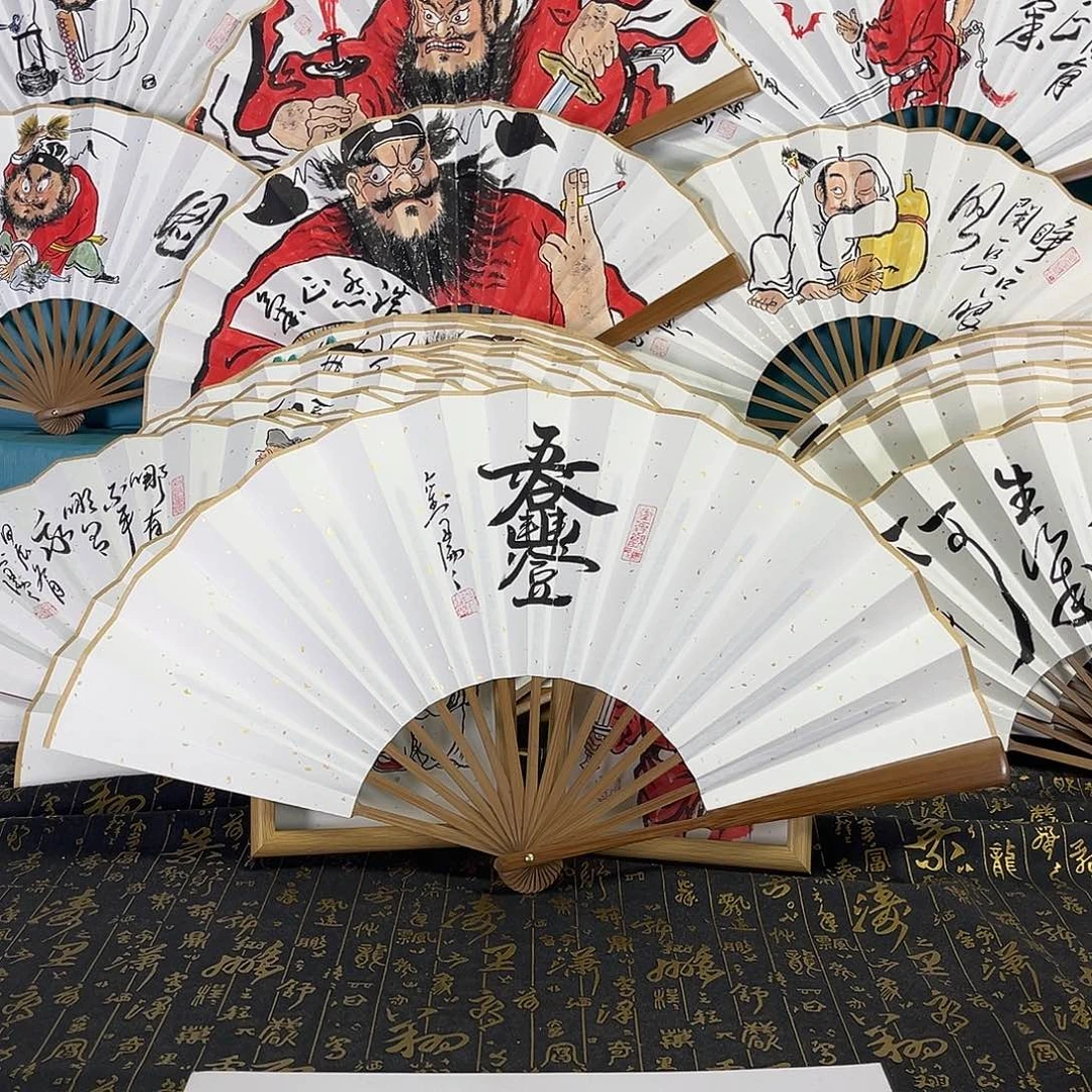 国画源**断手绘折扇一把