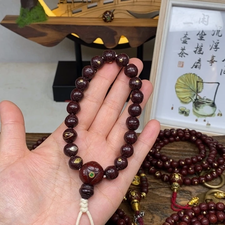 凤眼菩提吊坠10.8 3眼手持