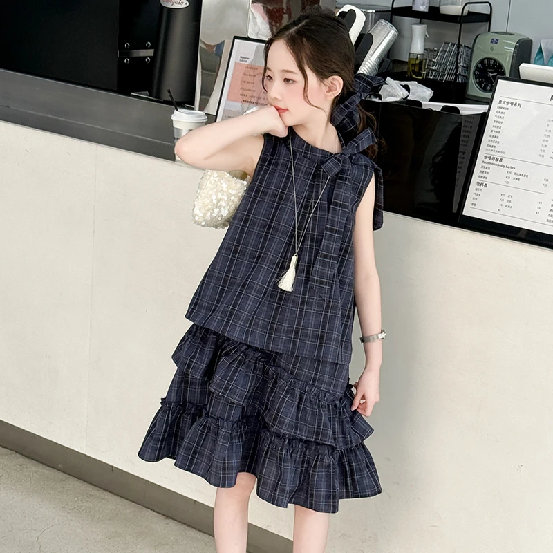 【嘻嘻柚】女童夏季领口系带格子不规则连衣裙2025新款无袖蛋糕裙潮