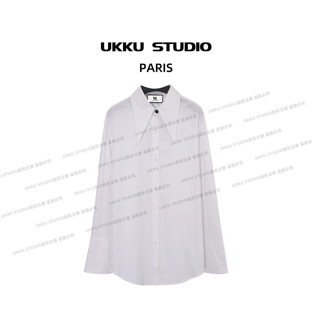 白白【UKKUSKUDIO】气质纯色弧形边排扣时尚早秋长袖衬衫2210204