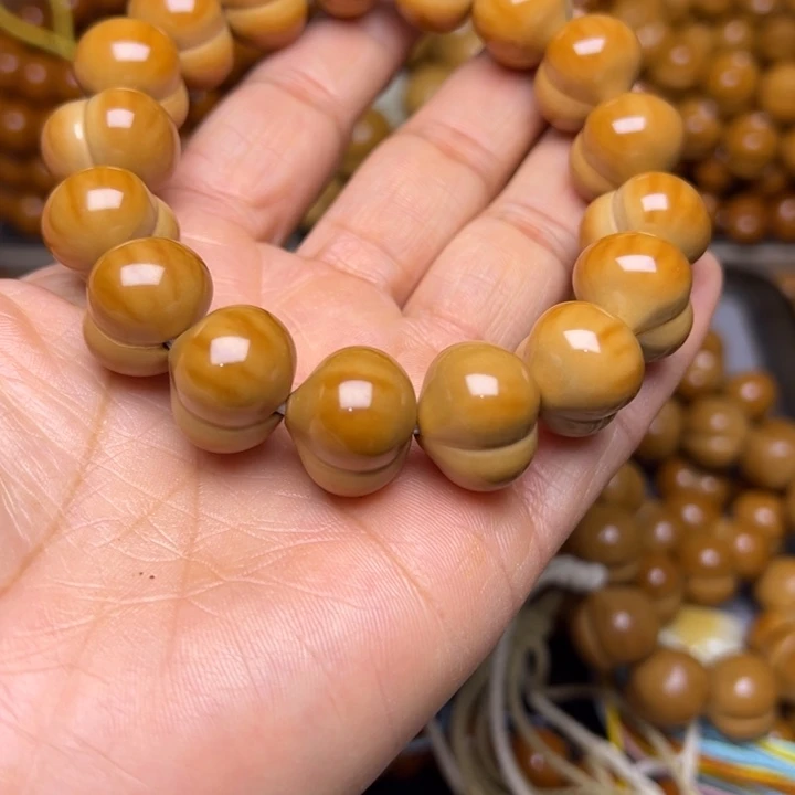 吊坠橄榄核无****义聚宝盆