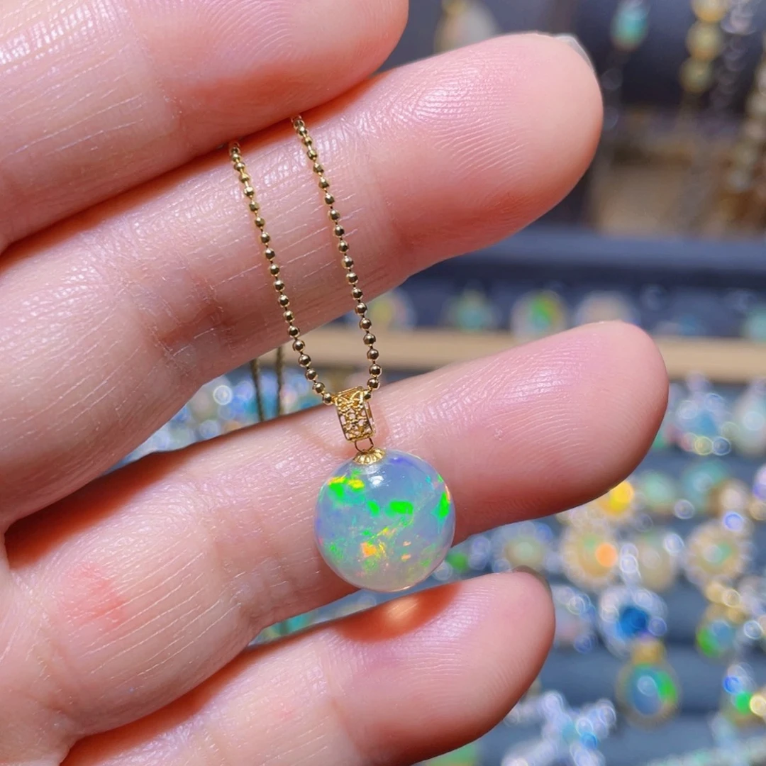 欧泊欧泊吊坠〉18K金镶嵌D****王