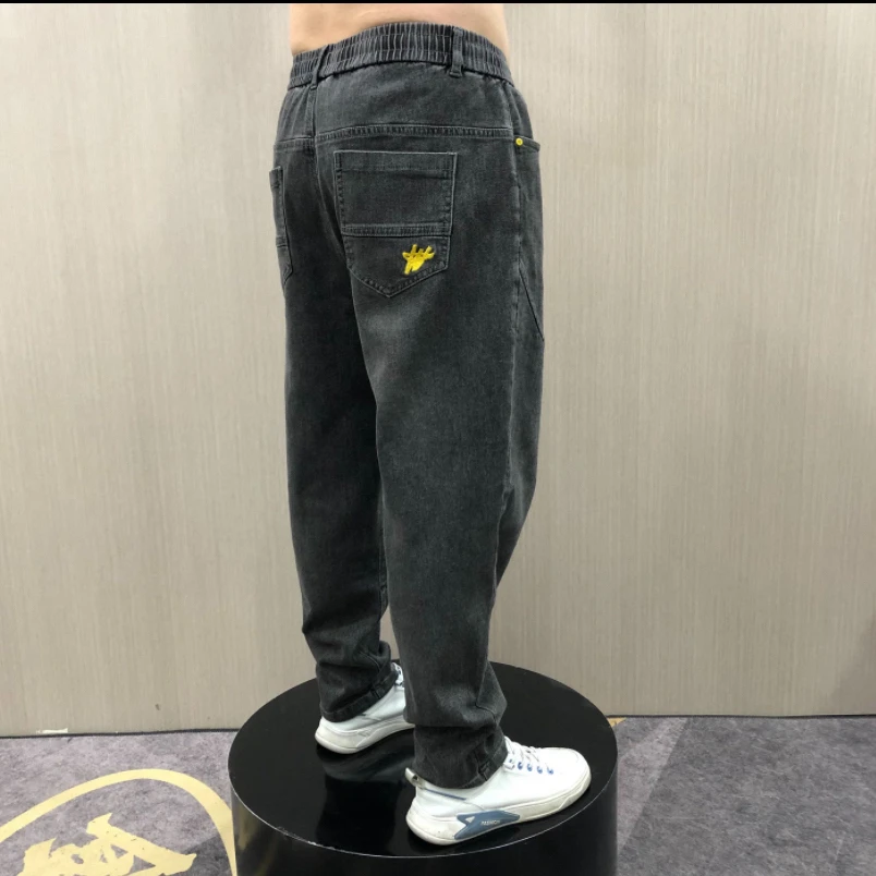 1106秋冬男士简约时尚百搭宽松弹力舒适休闲牛仔老爹小脚裤
