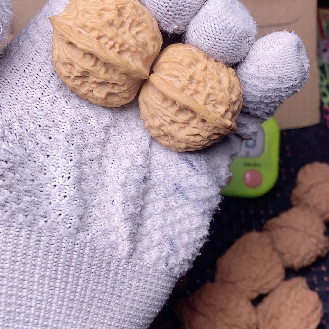 桃核把件问*？平谷寿桃