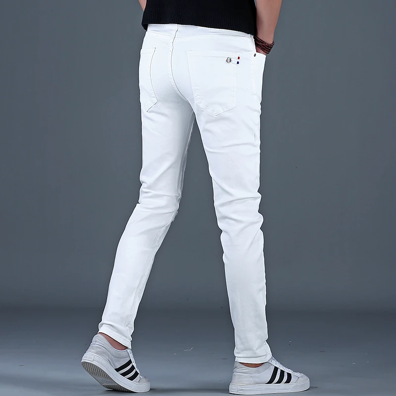 韩俊尼2025男士高端白色男装休闲百搭韩版潮牌修身修身牛仔裤弹力
