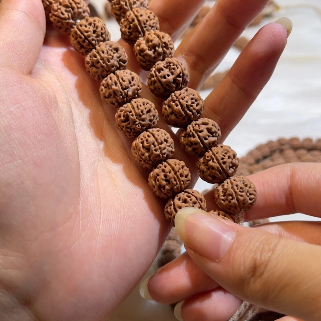 柚***.金刚菩提手串凹底梅花手串13