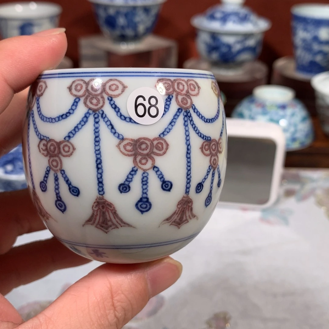 杯子H**胡68青花釉里红蛋蛋杯缩釉