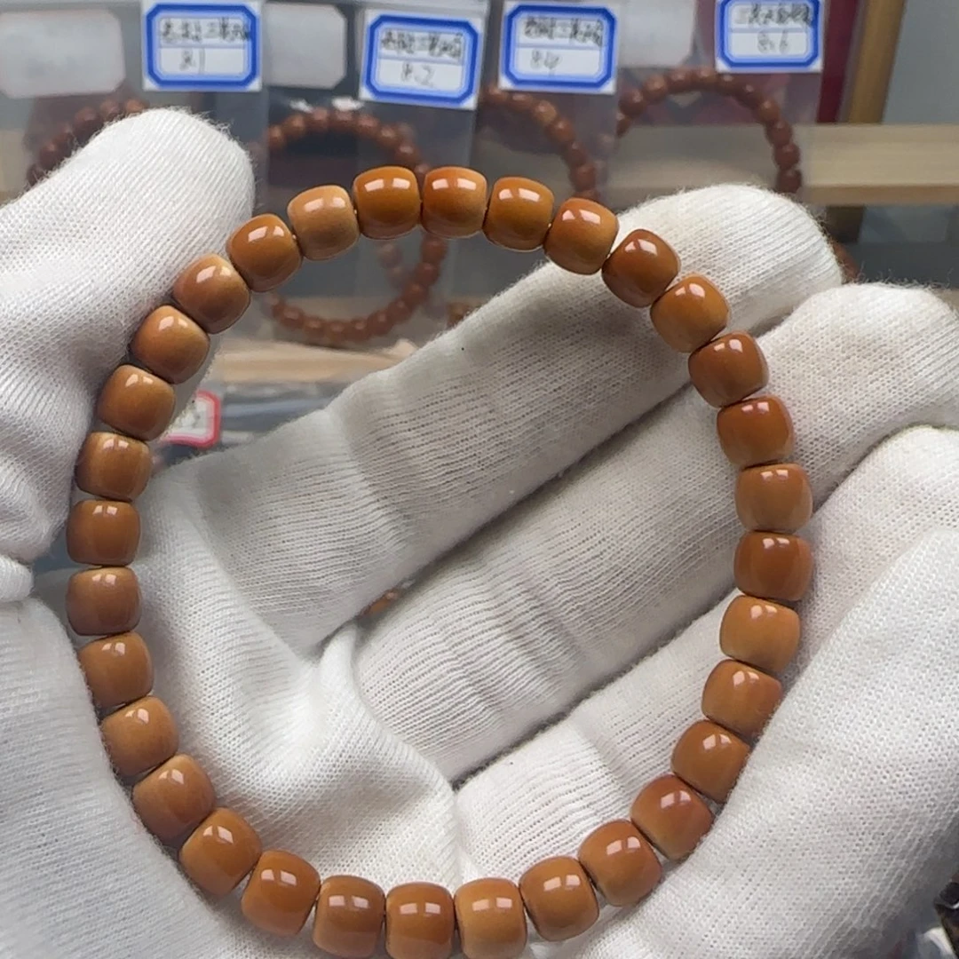 橄榄核手串老挝单圈极限弧三花无白7.1mm