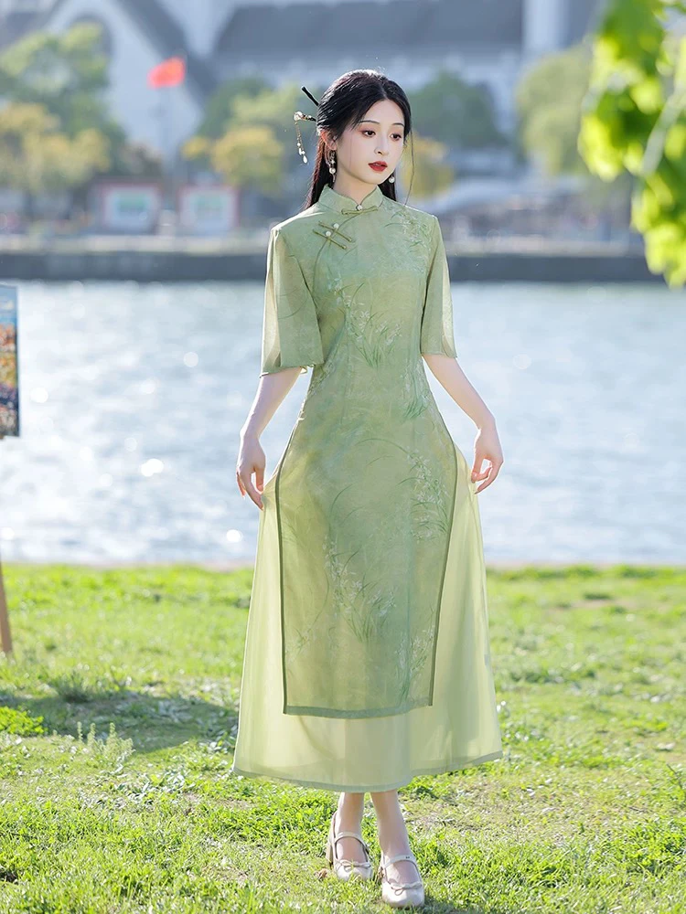 绿色奥黛旗袍2025新款高端高贵改良年轻款少女新中式日常可穿夏季