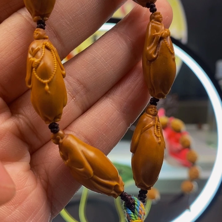 橄榄核吊坠欢欢欢欢回家斤斤计较斤斤计较