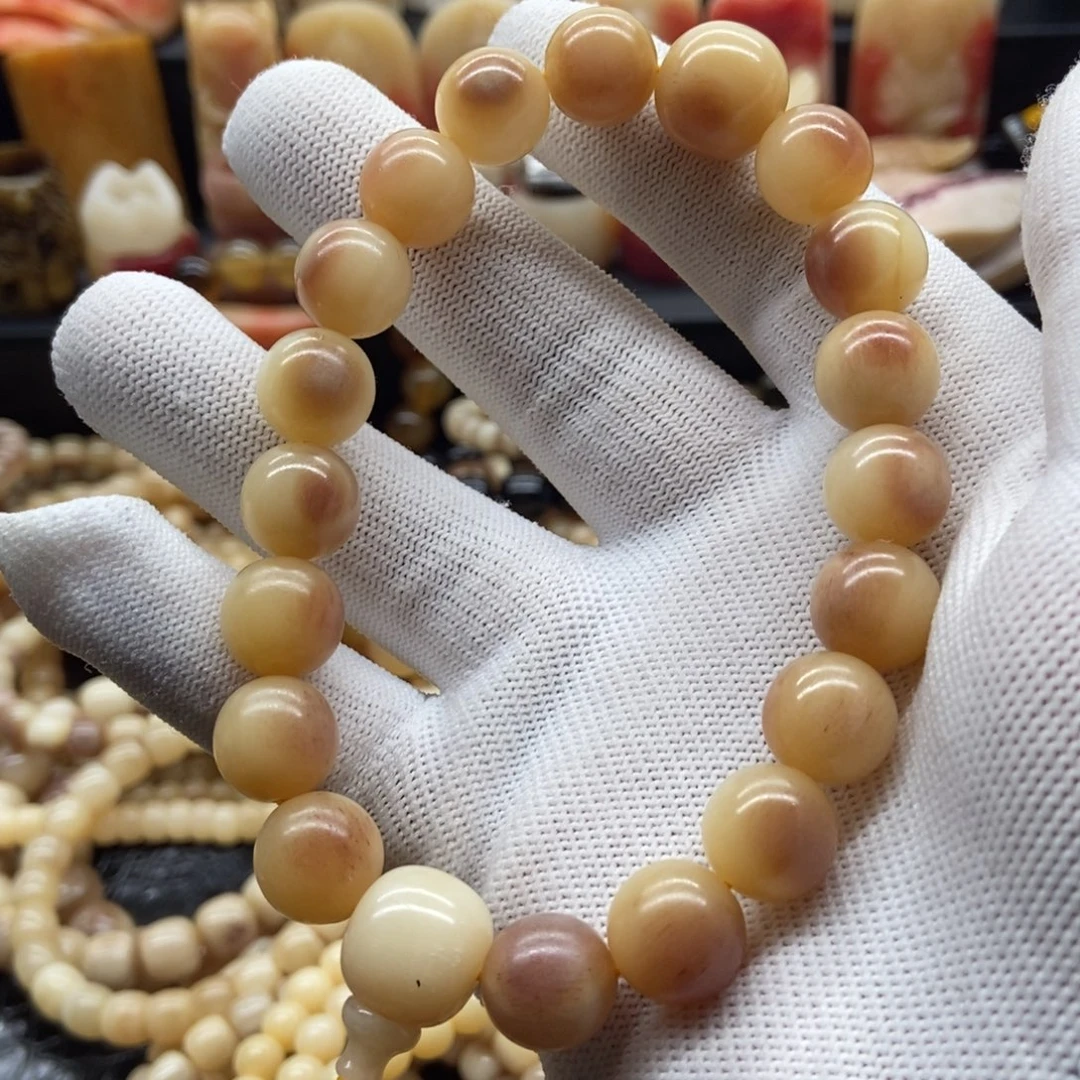 驼骨手串/手链12毫米血丝蝌蚪纹驼骨手持