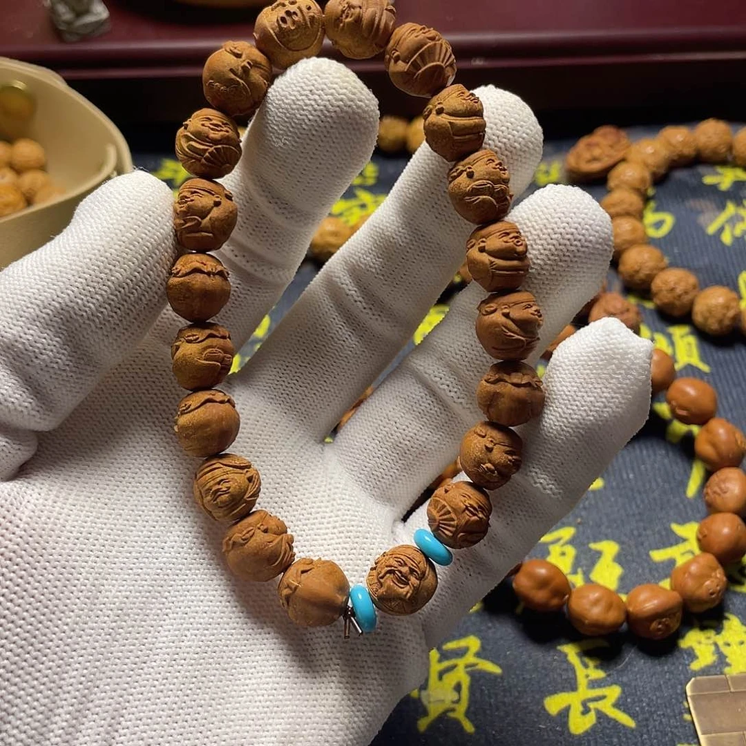 芳*龙纹桃核雕刻瑕疵财神