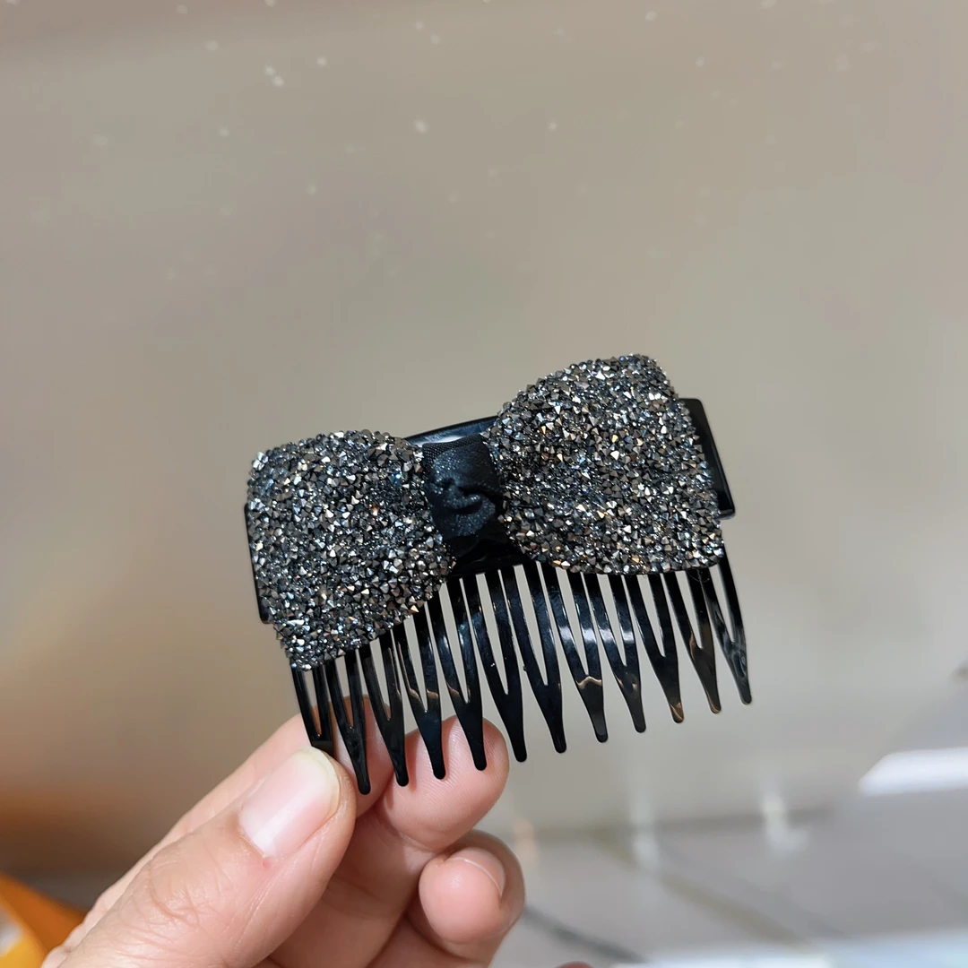 S42黑色蝴蝶结插梳