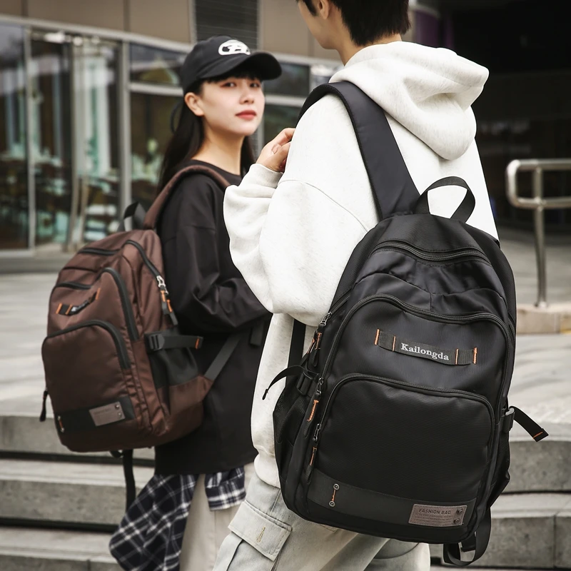 休闲百搭双肩包女初中高中大容量书包男小学4-6年级大学情侣背包