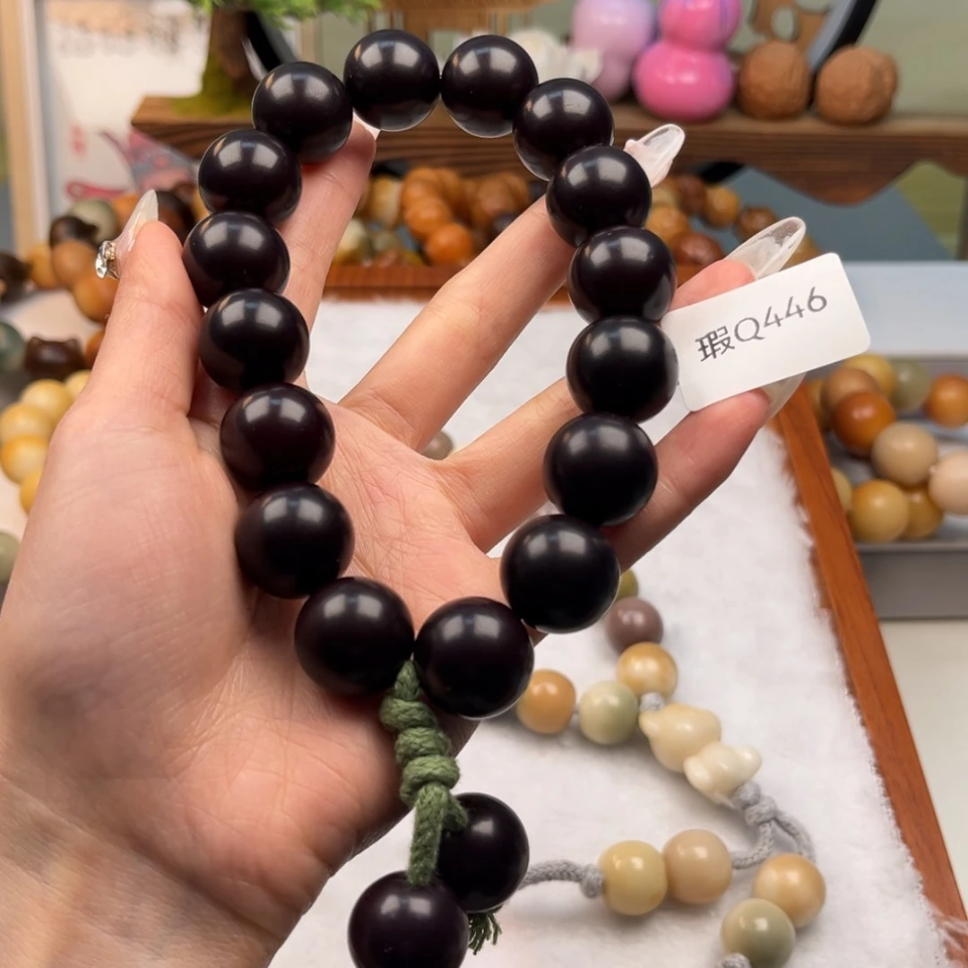 菩提根/象牙果吊坠大***?17mm瑕手持一串q446