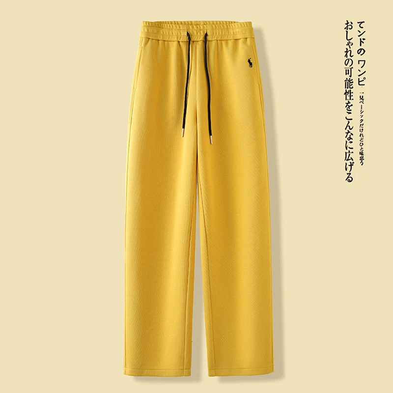 拉夏贝尔黄色刺绣运动卫裤女2025春秋季新款弯刀裤休闲香蕉阔腿裤