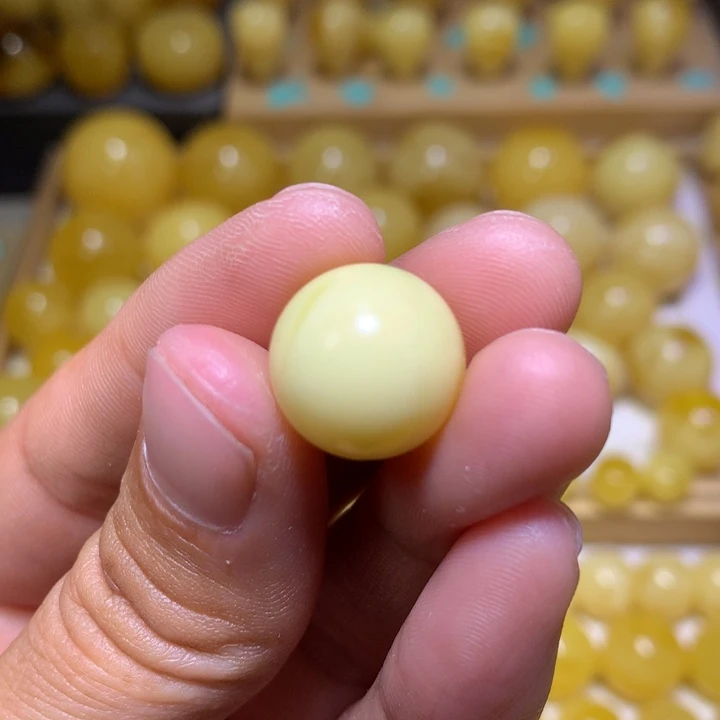 蜜蜡裸石未镶嵌一****?天然俄料金白妖花圆珠14.4