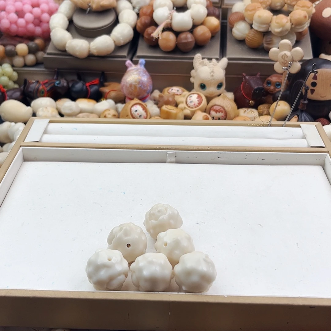 锌***琦吊坠菩提根/象牙果羊