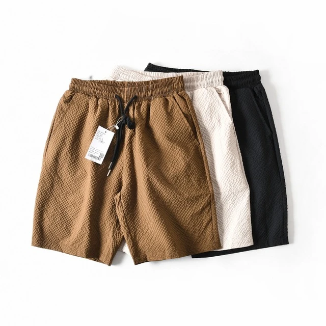 2025新款冰丝泡泡纱纯色运动短裤男士夏季轻薄宽松休闲五分中裤子