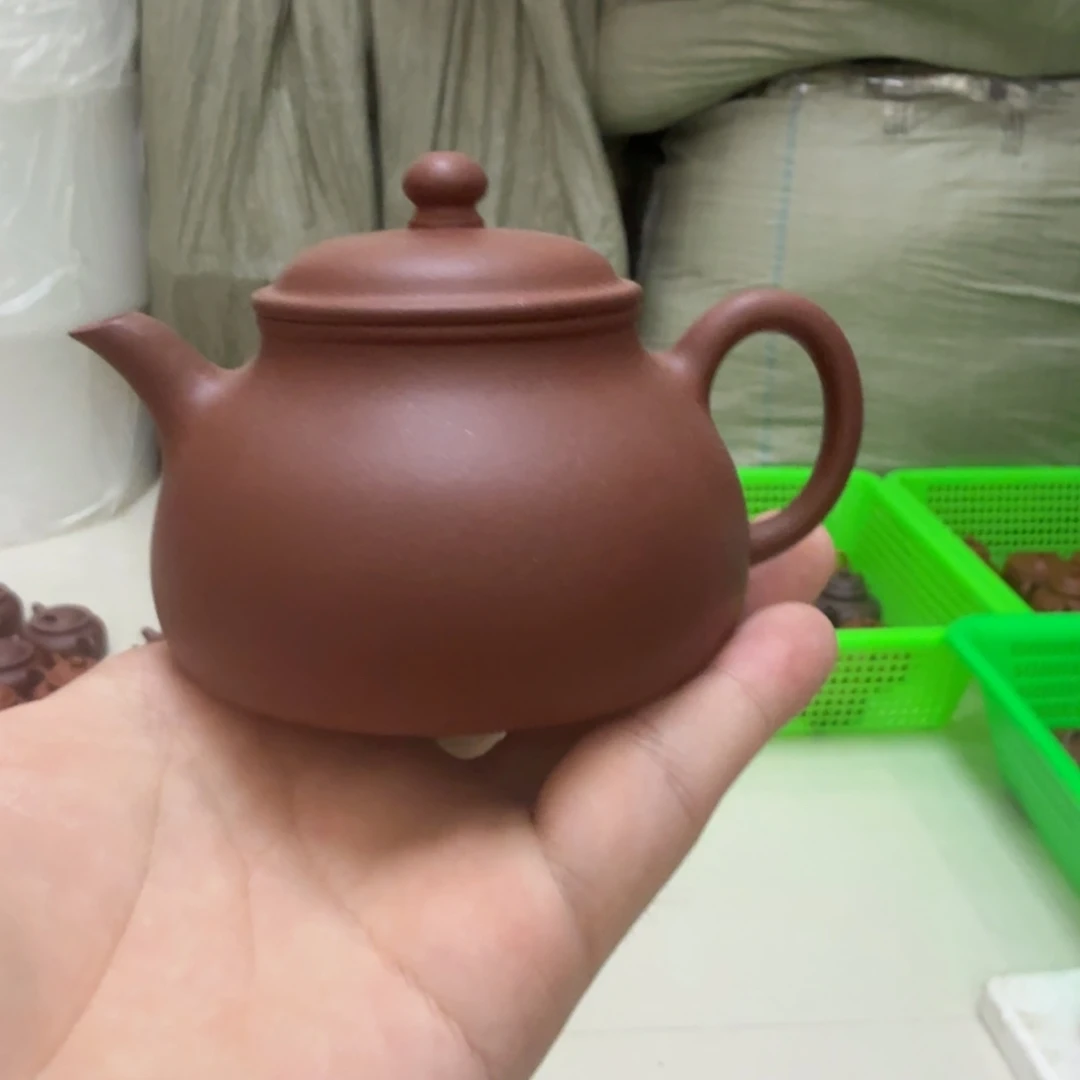 茶杯紫砂微瑕的壶