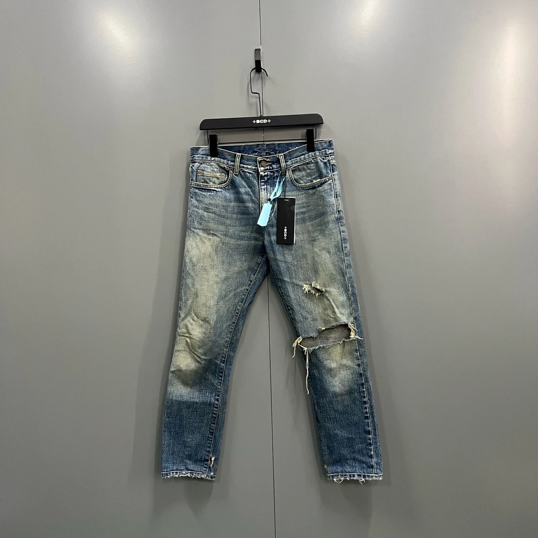 95新 YSL/圣罗兰 q218 slp 做旧破坏修身牛仔裤 31码/fg206797