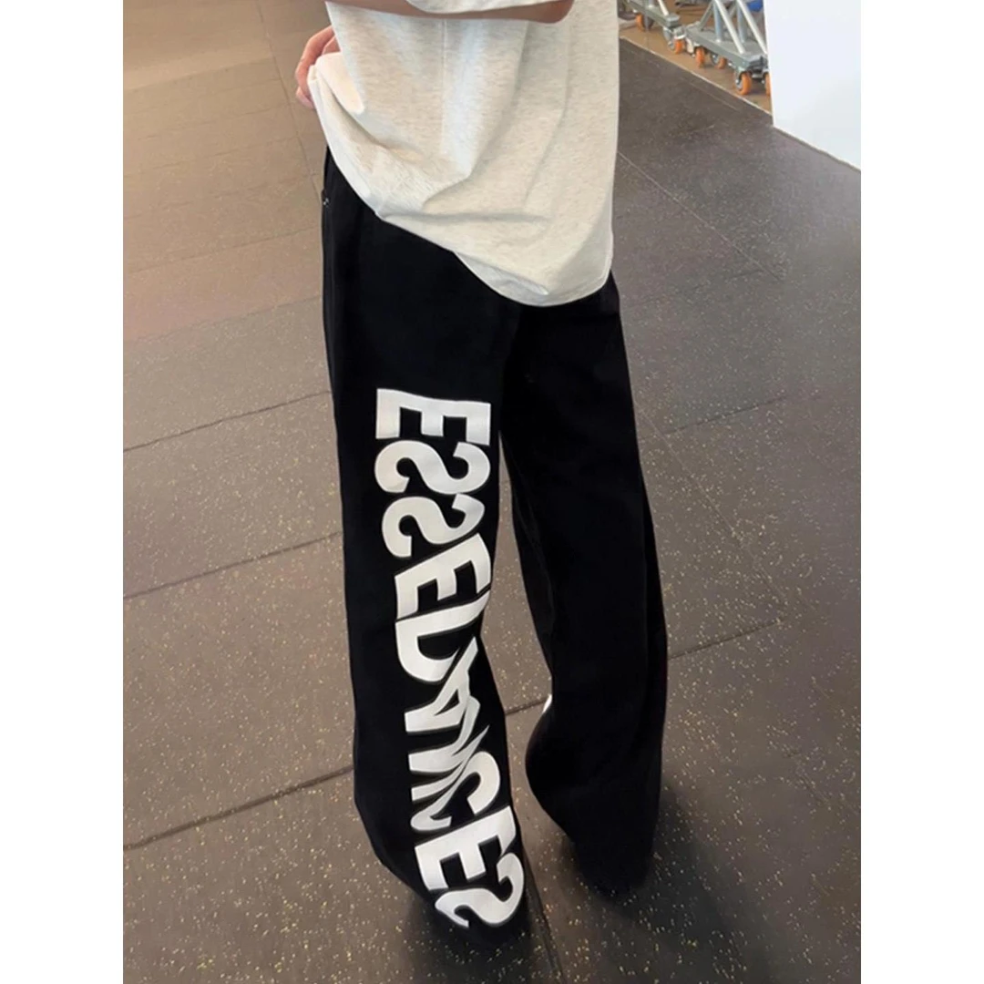 黑色微喇牛仔裤男秋季痞帅高级hiphop裤子美式高街修身直筒弯刀裤