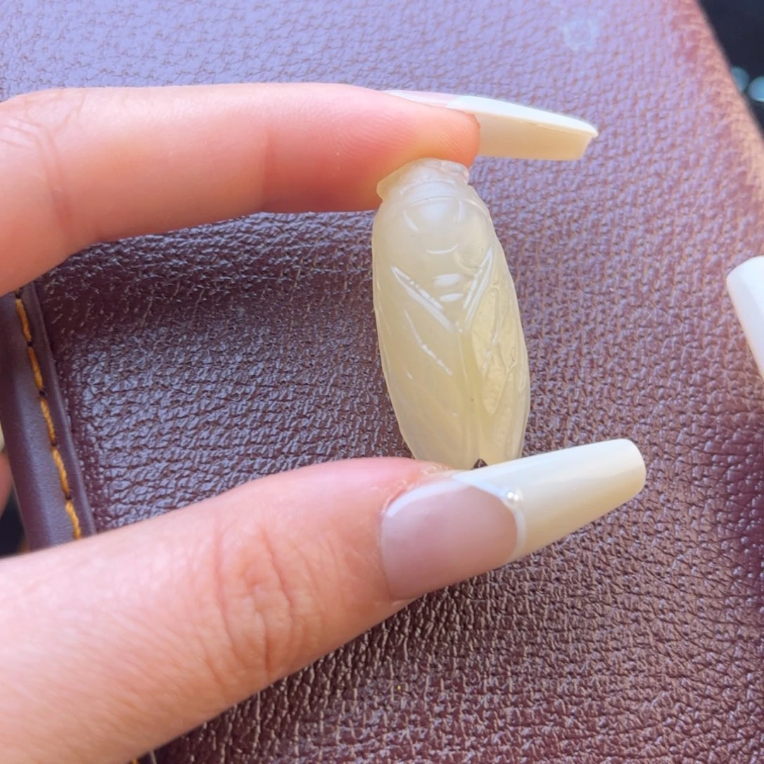 石英质玉黄蜡石吊坠未镶嵌小**吖