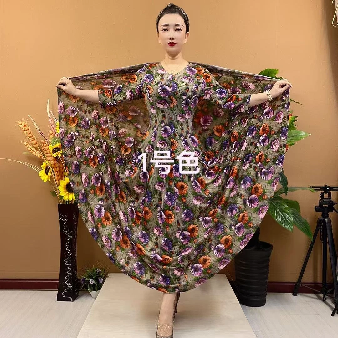 新款时尚百搭收腰显瘦清爽彩花弹力大码过膝长裙2501