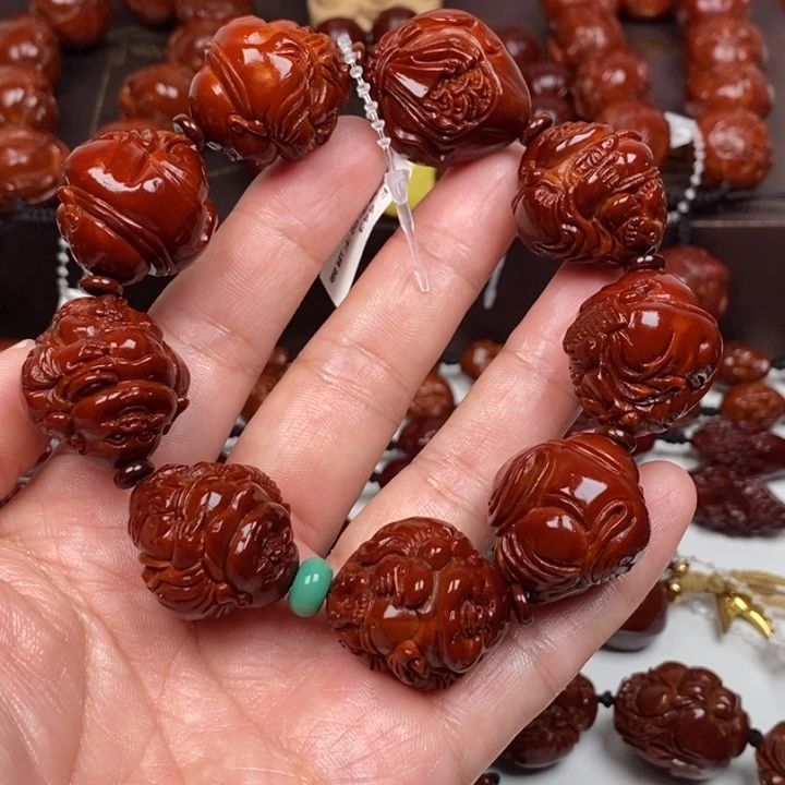 橄榄核吊坠这****妞887776655