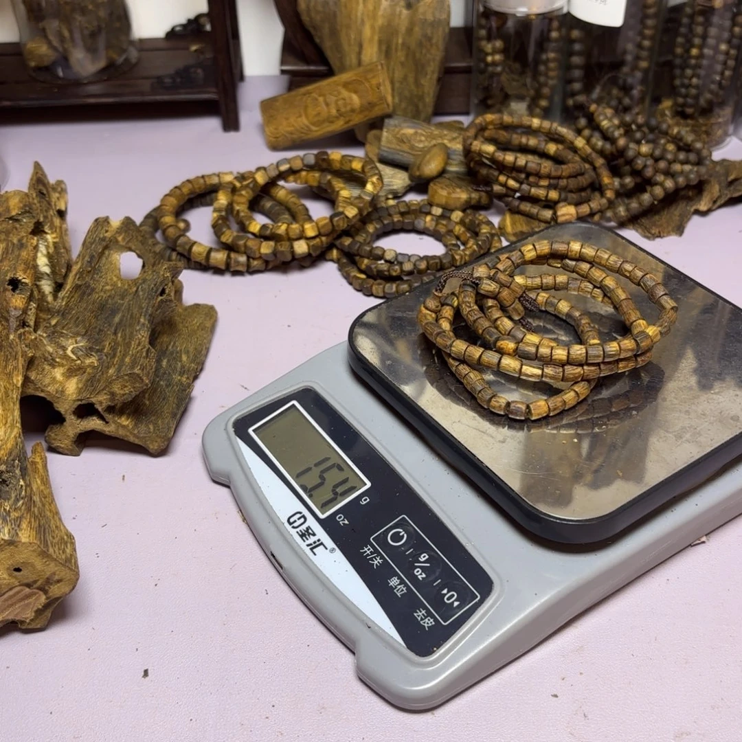 伍***门木奇楠原材料桶珠15.4克卡6