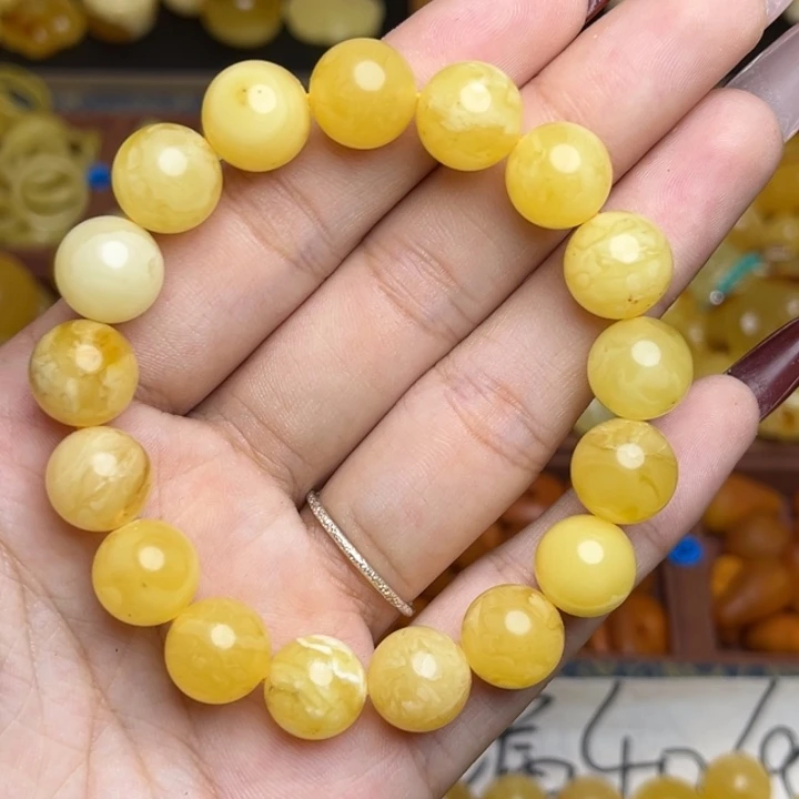 蜜蜡未镶嵌珠宝奇石微瑕福利鸡油黄满蜡妖花圆珠手串卡22