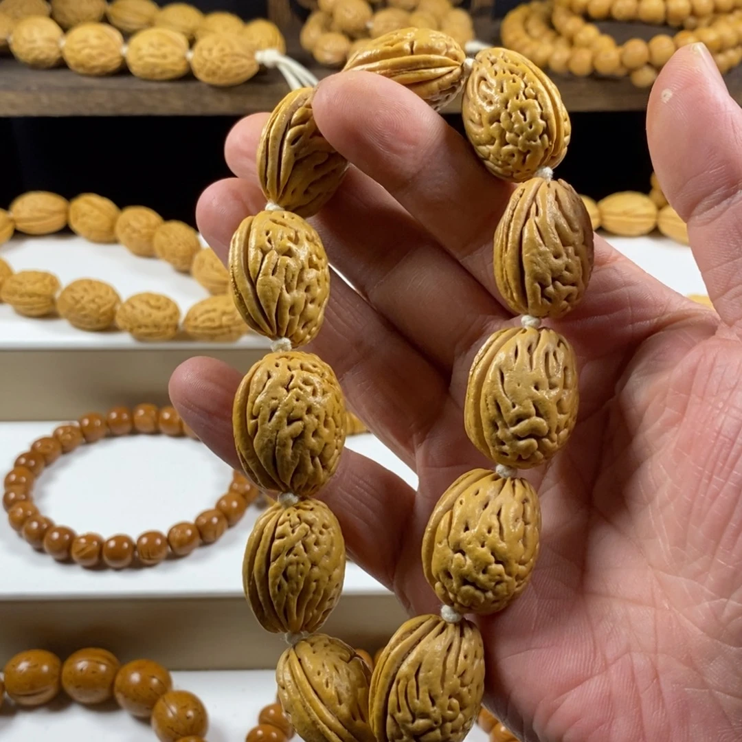 没***镜桃核吊坠沈阳大高炮钱袋手持