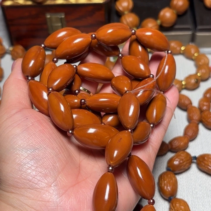 晓***笑橄榄核手串/手链1.3光珠脖挂