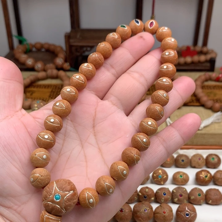 天***际凤眼菩提吊坠手持