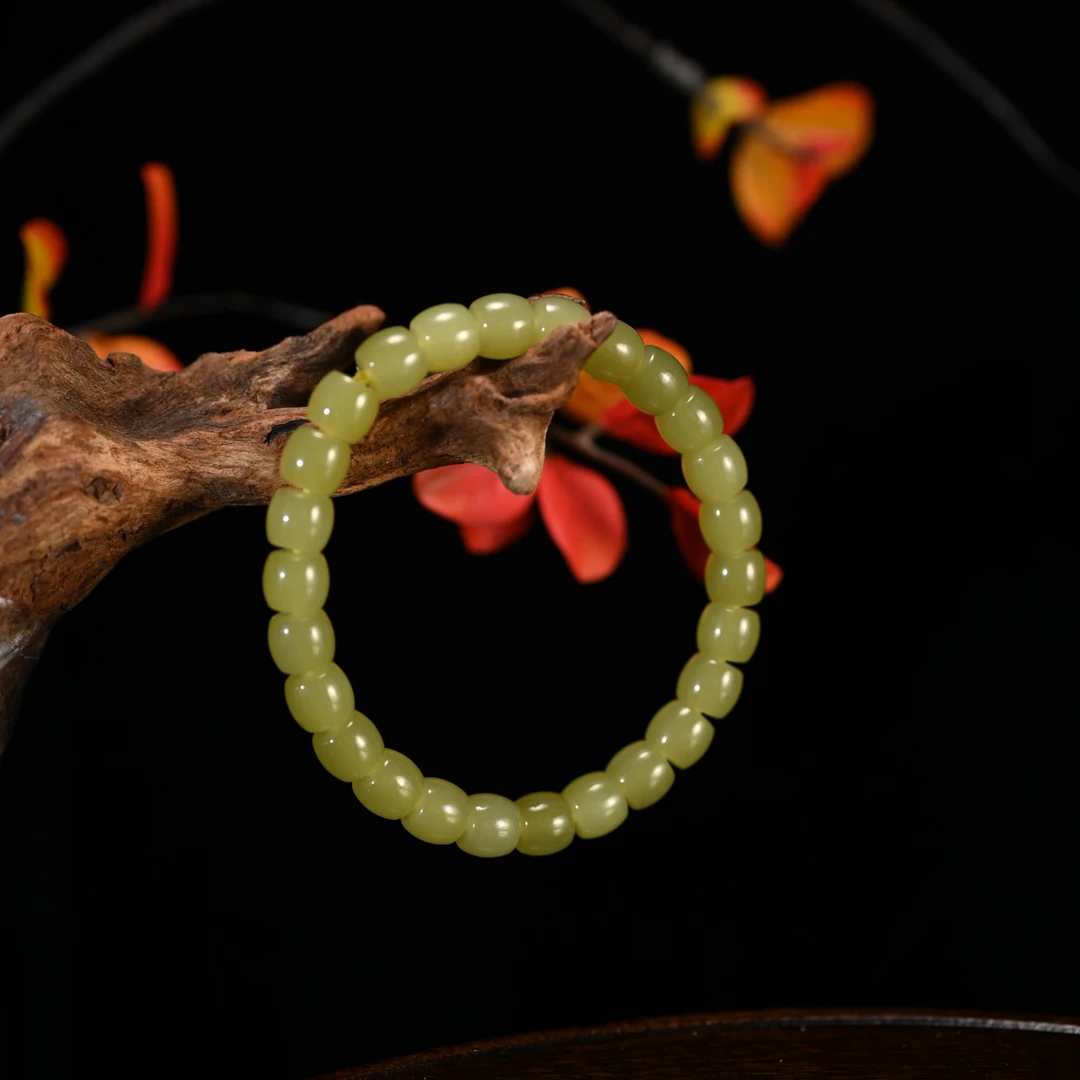 LOT8821 2512090041和田玉黄玉直切手串/保利