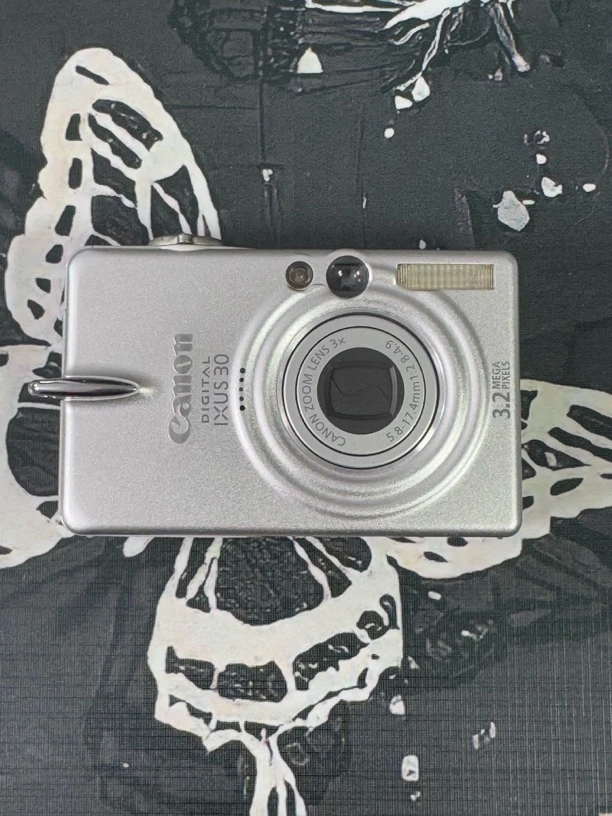 9新 Canon/佳能 ixus30 银色 复古ccd数码相机