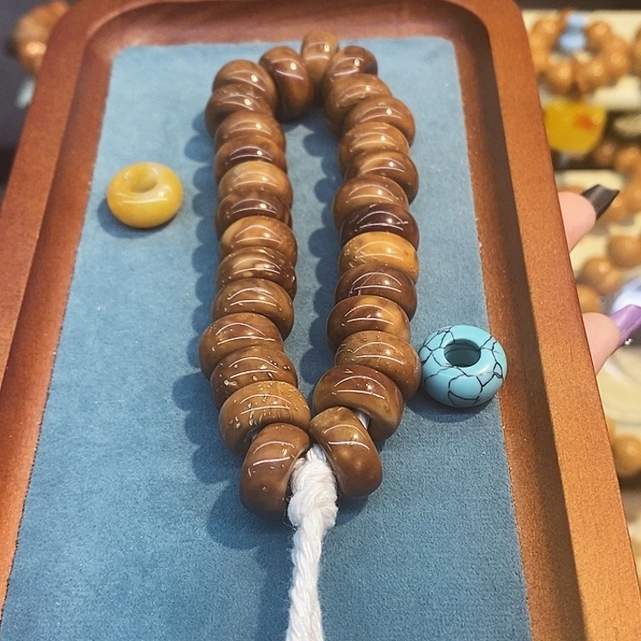 转***身手串猴头核桃库克甜甜圈流苏