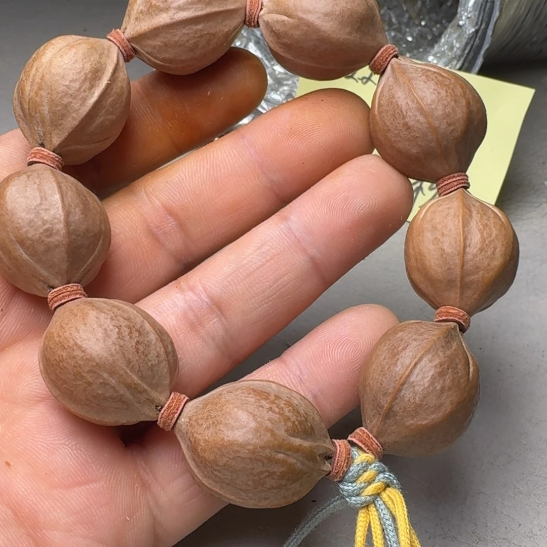 得***瑟橄榄核手串橄榄核