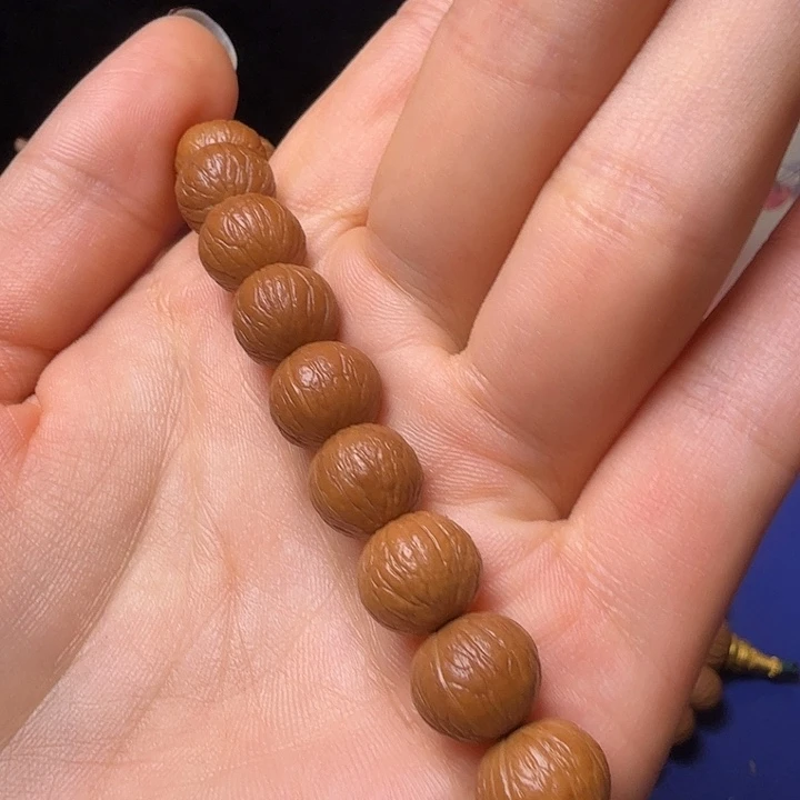 *****猴头核桃手串凤羽