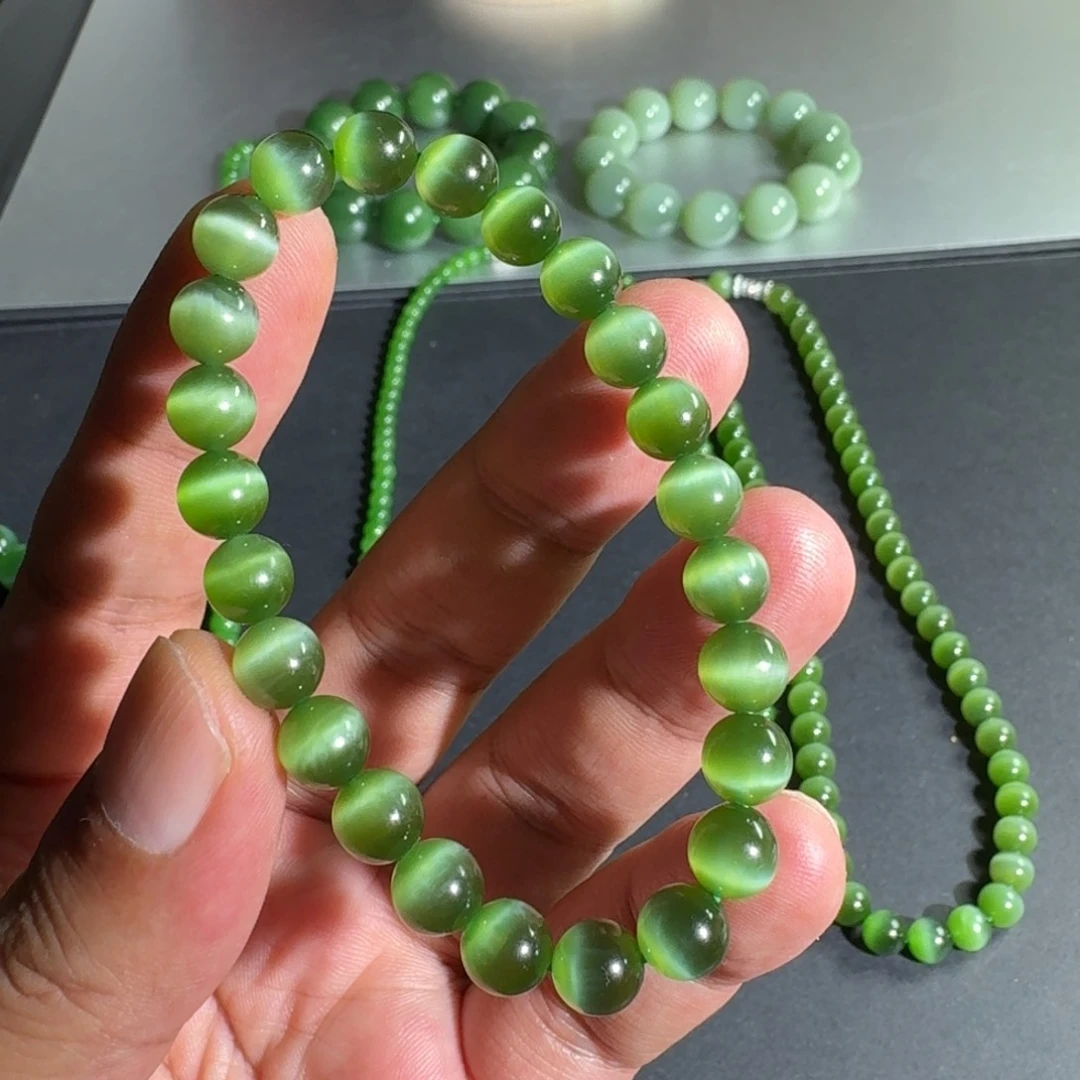 手串未镶嵌和田玉（碧玉）蚊*。