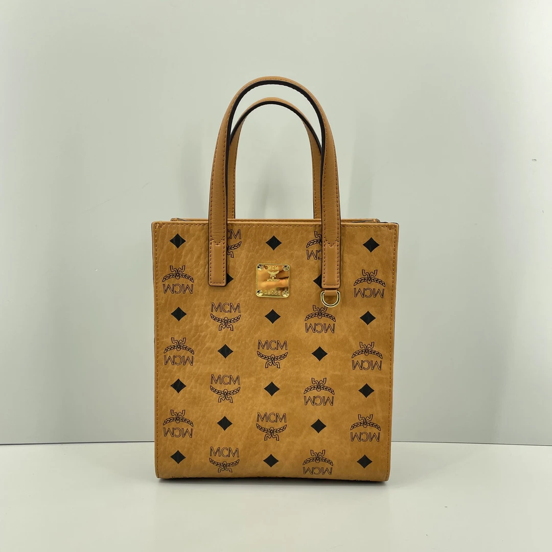 95新 MCM mcm干邑色小号琴谱包19*22*8cmE030409