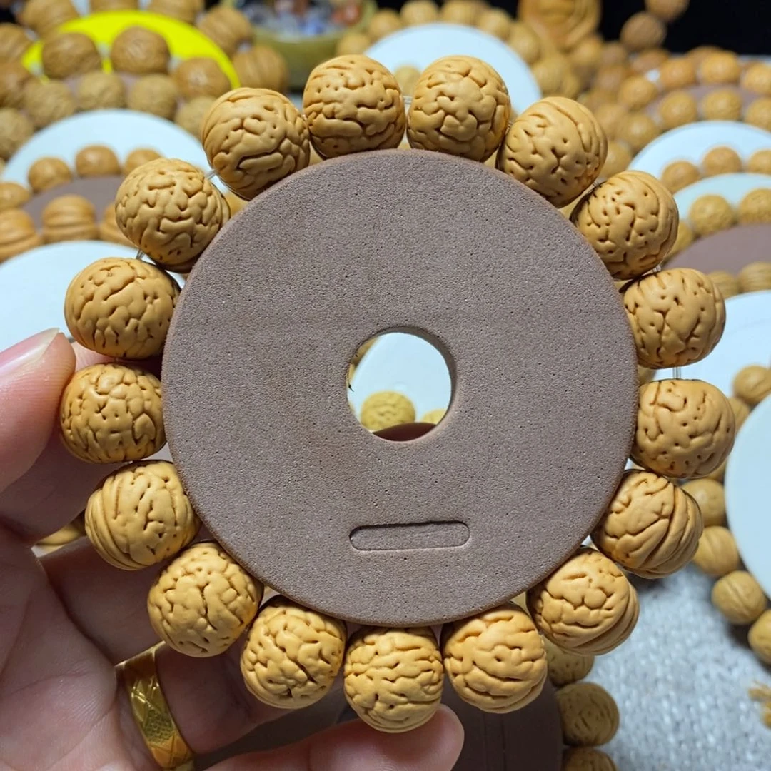 桃核手串加***稻金丹桃核