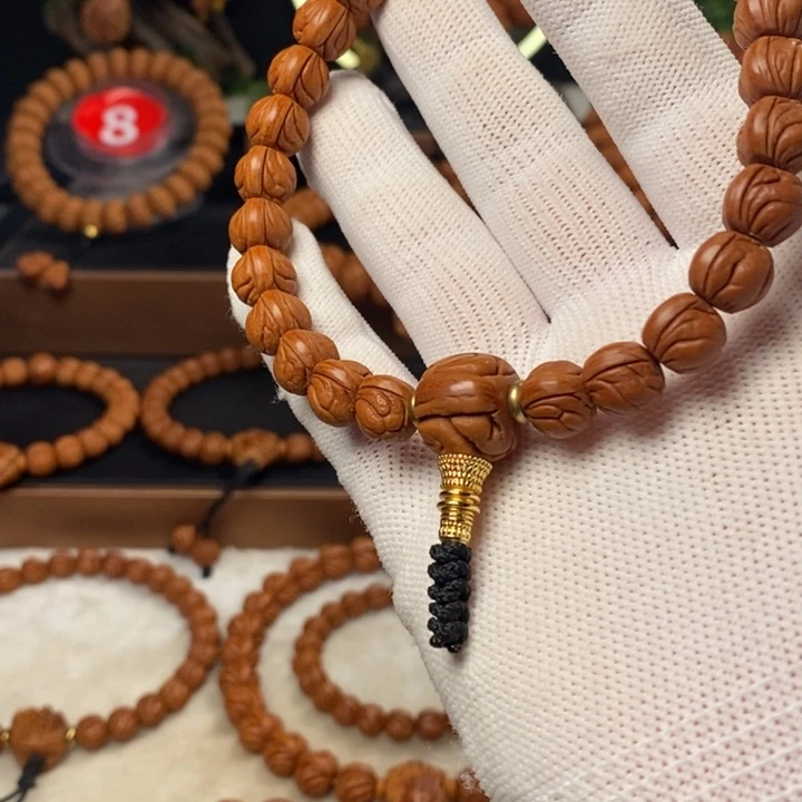 桃核吊坠s***p秦岭龙纹桃核