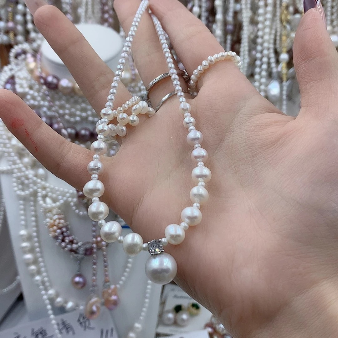 云***喜淡水珍珠银S925镶嵌耳饰