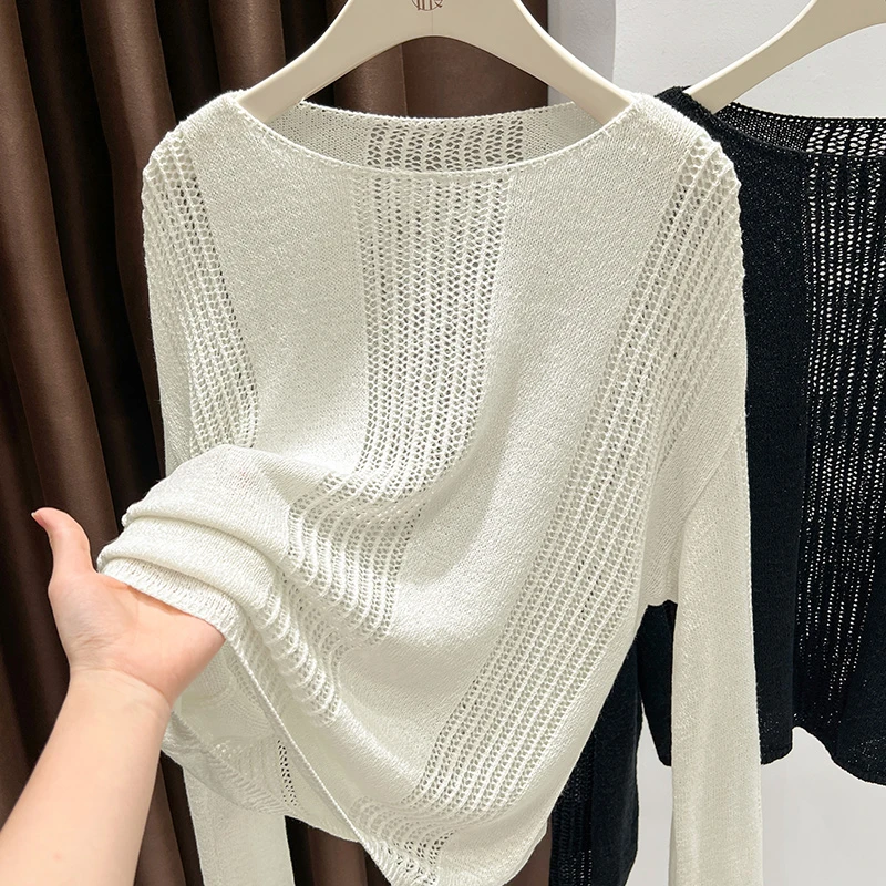 设计感镂空白色针织罩衫女2025春季爆款薄款百搭圆领长袖外搭上衣