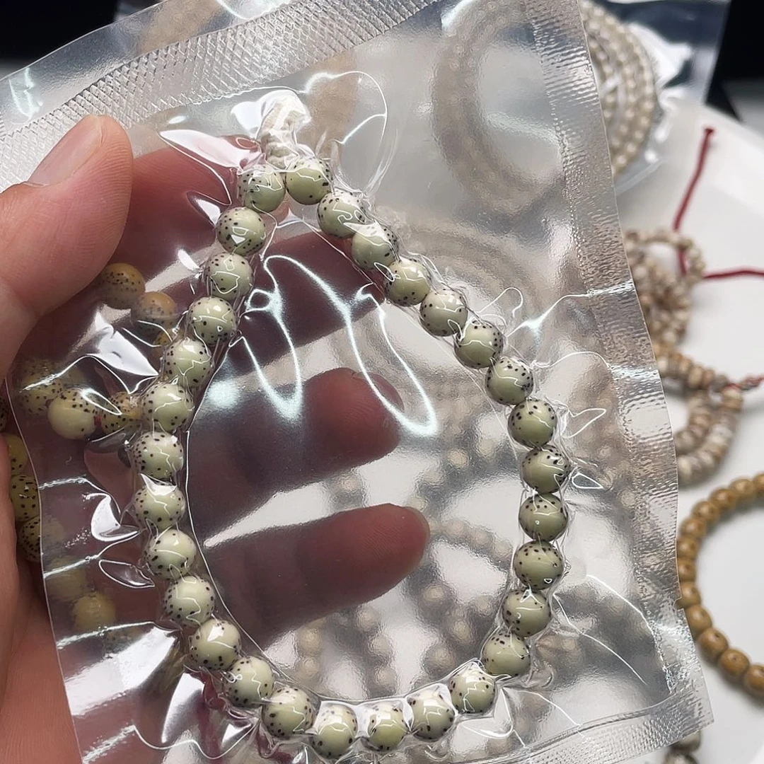 吊坠星月菩提同枝古瓷白卡8河豚手持